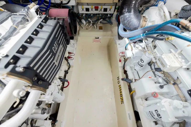 Slide: The Image of Engine room of 1999 Hatteras 52 Sport Deck Motor Yacht with CAT marine power systems. - 15