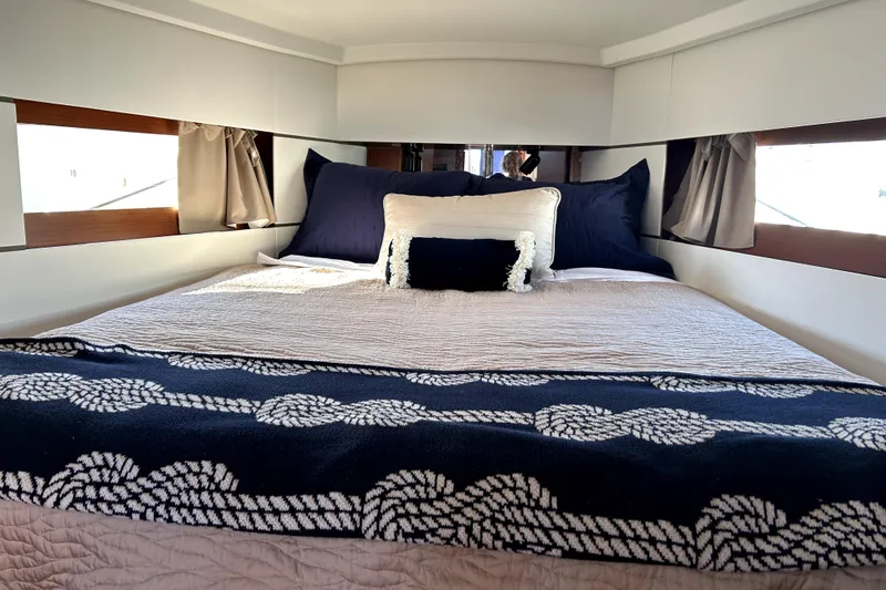 Slide: The Image of Luxurious cabin interior of 2019 Beneteau Oceanis 38.1 yacht with cozy bedding. - 4