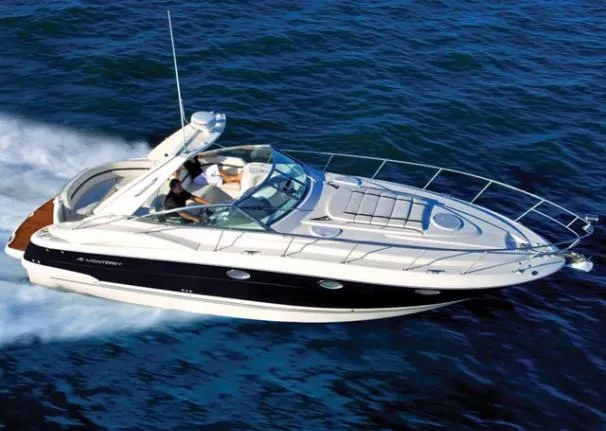 The Image of 2009 Monterey 350 Sport Yacht docked at a marina, showcasing sleek design and luxury features. - 0