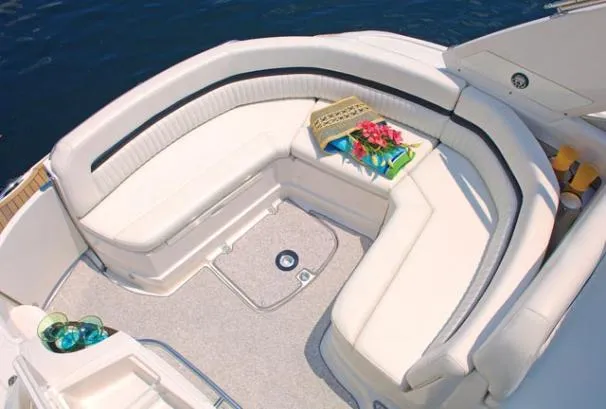 Slide: The Image of 2009 Monterey 350 Sport Yacht docked at marina, covered in blue canvas. - 2