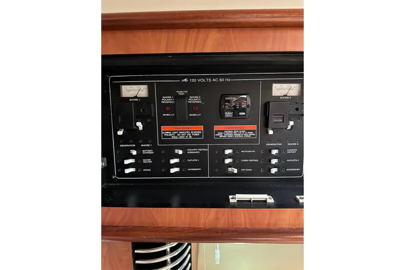 Slide: The Image of Electrical control panel of a 2009 Monterey 350 Sport Yacht. - 26