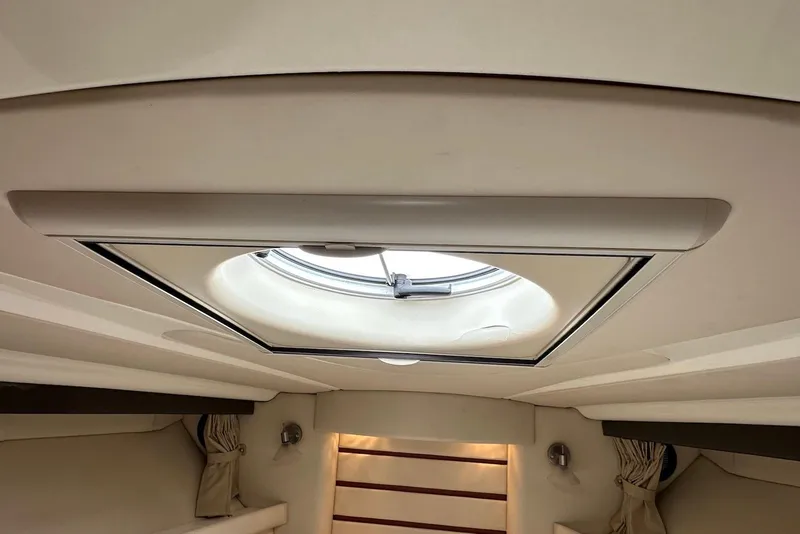 Slide: The Image of 2009 Monterey 350 Sport Yacht interior with circular skylight and elegant design. - 38