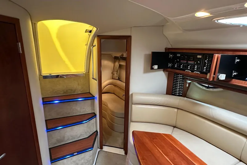Slide: The Image of Interior of 2009 Monterey 350 Sport Yacht with seating, stairs, and control panel. - 45