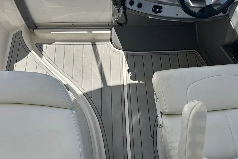 Slide: The Image of 2009 Monterey 350 Sport Yacht interior with white seating and sleek flooring. - 9
