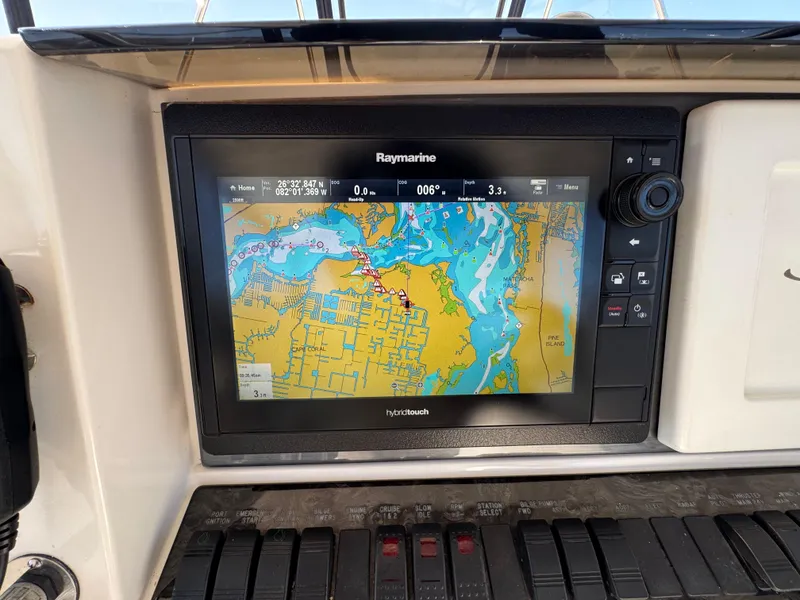 Slide: The Image of Raymarine navigation display on 2007 Sea Ray 52 Sedan Bridge yacht dashboard. - 10