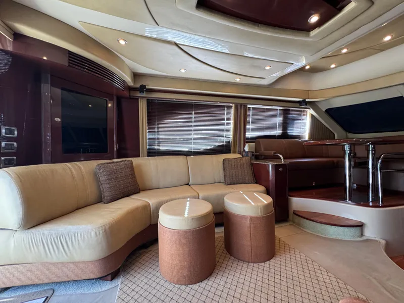 Slide: The Image of Luxurious interior of a 2007 Sea Ray 52 Sedan Bridge yacht with elegant seating. - 21