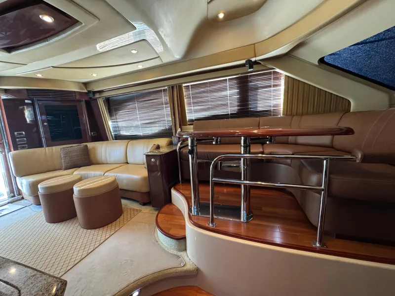 Slide: The Image of Luxurious interior of 2007 Sea Ray 52 Sedan Bridge yacht with leather seating and elegant design. - 24
