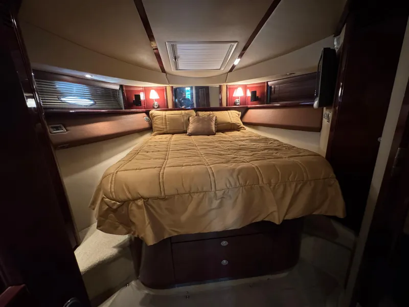 Slide: The Image of Luxurious bedroom interior of 2007 Sea Ray 52 Sedan Bridge yacht. - 35