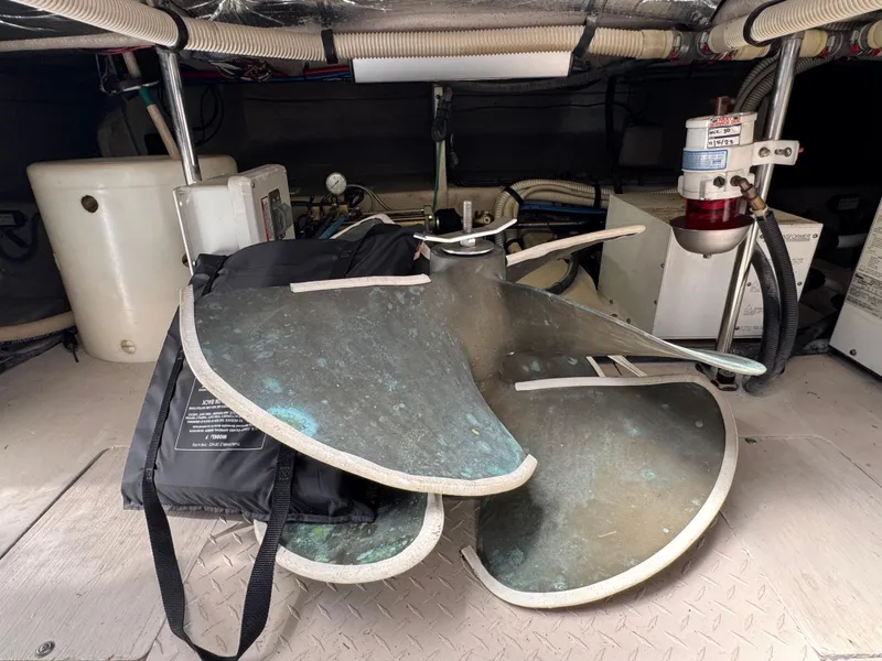 Slide: The Image of Engine room of 2007 Sea Ray 52 Sedan Bridge with large propeller. - 48