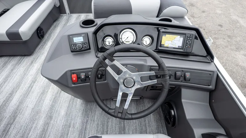 Slide: The Image of Bennington 16 S CRUISE JUMP SEAT 2026 helm with navigation system. - 16