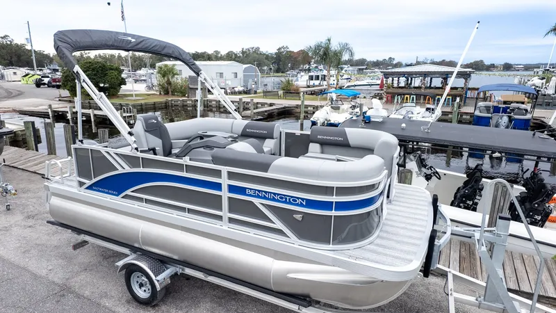 Slide: The Image of Bennington 16 S Cruise Jump Seat pontoon boat at dock, year 2026. - 3