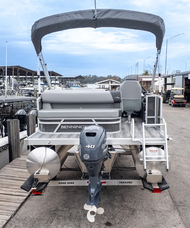 Slide: The Image of 2026 Bennington 16 S Cruise Jump Seat pontoon boat at dock. - 5