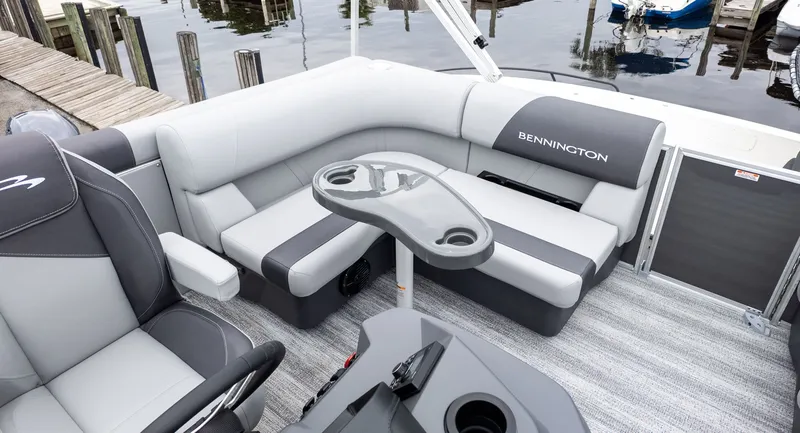 Slide: The Image of Interior of 2026 Bennington 16 S Cruise Jump Seat with gray seating. - 8