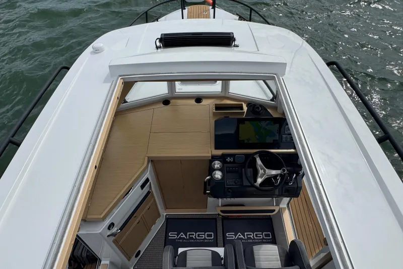 Slide: The Image of Interior view of Sargo 28 boat, 2025 model, featuring modern cockpit. - 14