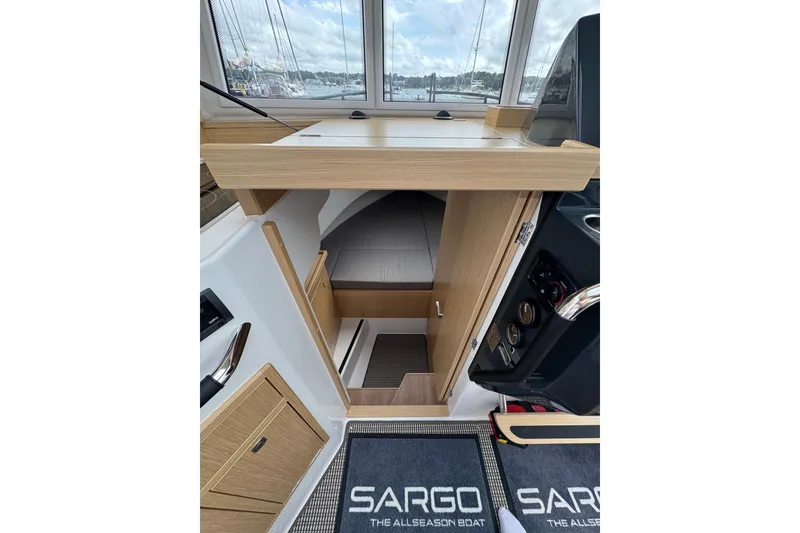Slide: The Image of Interior of 2025 Sargo 28 yacht with wooden finish. - 15