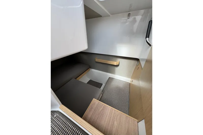 Slide: The Image of Interior cabin of 2025 Sargo 28 boat, featuring modern design and comfortable seating. - 24