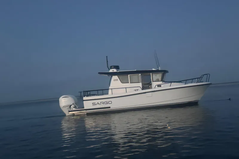 Slide: The Image of Sargo 28 boat from 2025 on calm water. - 3