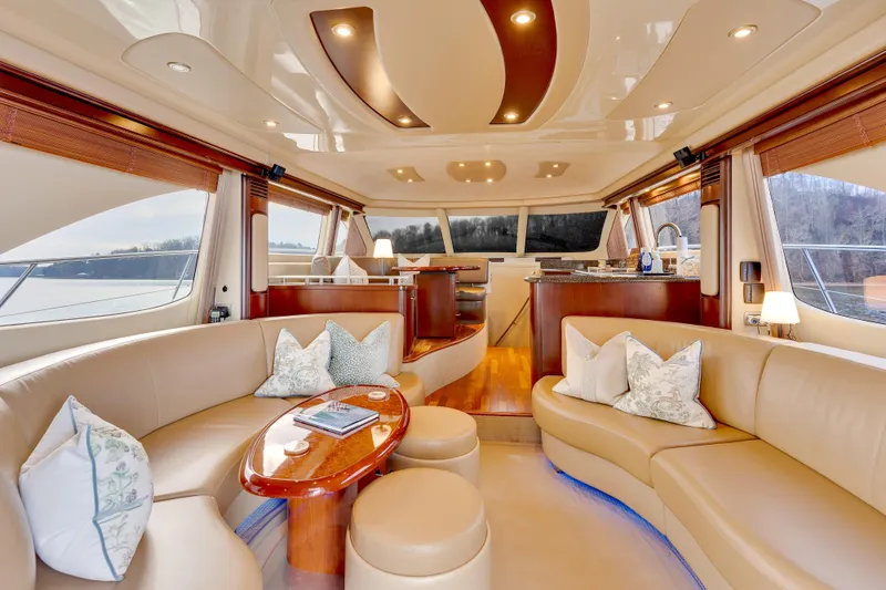 Slide: The Image of Luxurious interior of 2006 Sea Ray 58 Sedan Bridge yacht with elegant seating and decor. - 18