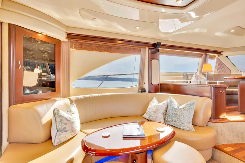 Slide: The Image of Luxurious interior of 2006 Sea Ray 58 Sedan Bridge yacht with elegant seating and decor. - 20