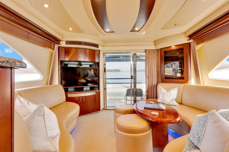 Slide: The Image of Luxurious interior of 2006 Sea Ray 58 Sedan Bridge yacht with elegant seating and modern amenities. - 22