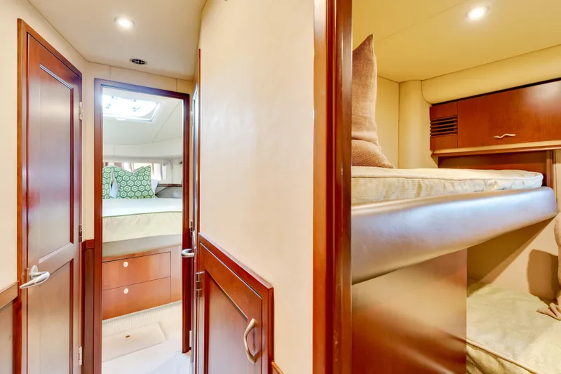 Slide: The Image of Luxurious interior of 2006 Sea Ray 58 Sedan Bridge yacht with cozy cabins. - 27