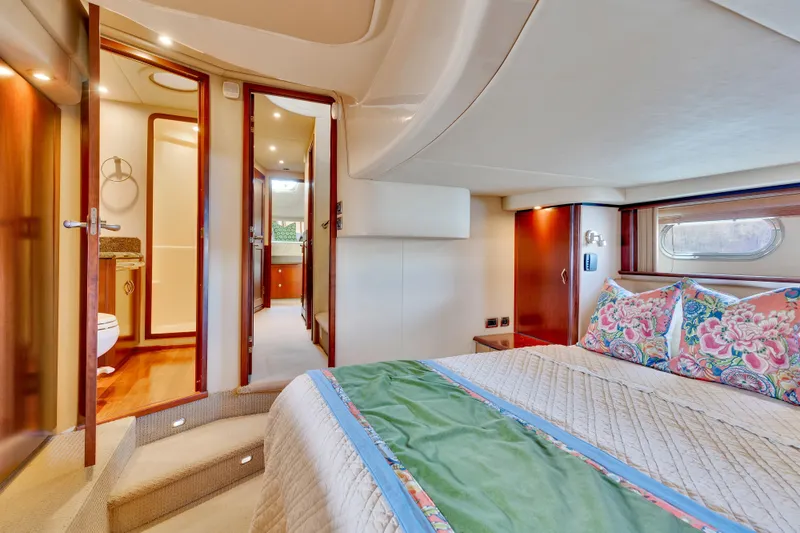 Slide: The Image of Luxurious bedroom interior of 2006 Sea Ray 58 Sedan Bridge yacht with en-suite bathroom. - 28