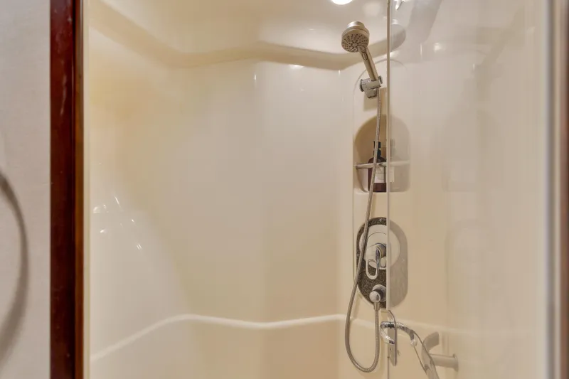 Slide: The Image of Shower area in 2006 Sea Ray 58 Sedan Bridge yacht, featuring modern fixtures. - 32