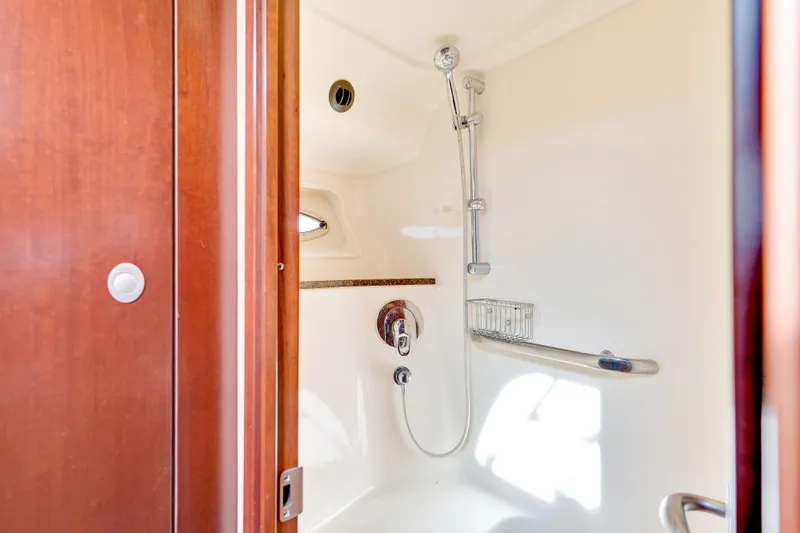 Slide: The Image of Shower area in 2006 Sea Ray 58 Sedan Bridge yacht, featuring sleek design and modern fixtures. - 37