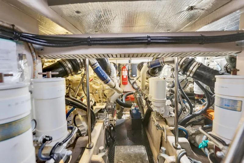 Slide: The Image of Engine room of 2006 Sea Ray 58 Sedan Bridge yacht, showcasing mechanical components. - 44