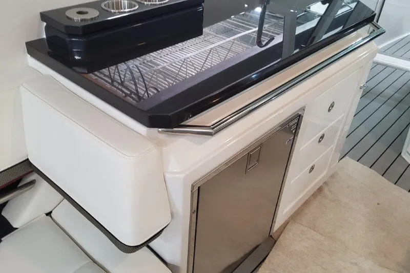 Slide: The Image of 2022 Formula 380 Super Sport Crossover OB interior with sleek cabinetry and modern design. - 36