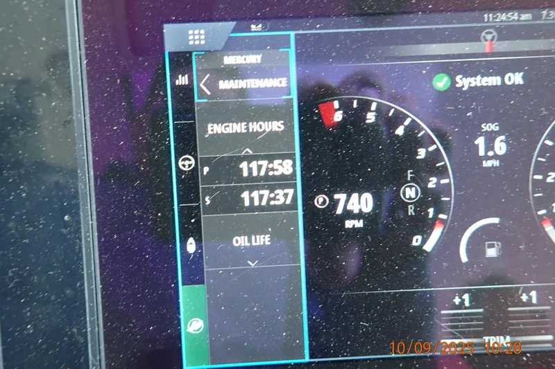 Slide: The Image of Dashboard of a 2022 Formula 380 Super Sport Crossover OB showing engine hours and RPM. - 41