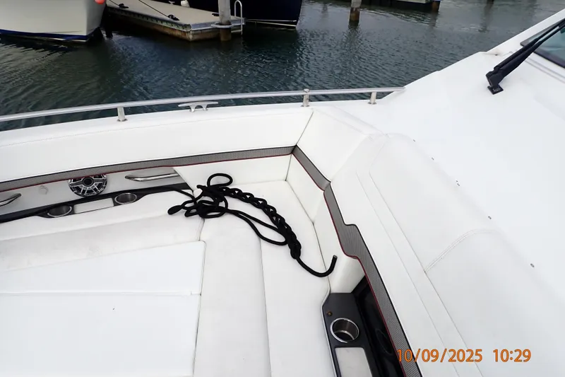 Slide: The Image of 2022 Formula 380 Super Sport Crossover OB boat interior with seating and rope. - 43