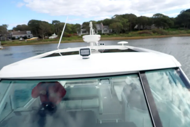 Slide: The Image of 2022 Formula 380 Super Sport Crossover OB on a scenic waterway. - 48