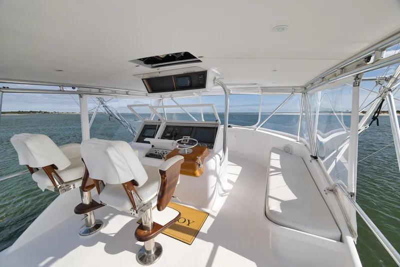 Slide: The Image of Luxurious helm of 2002 Paul Mann 60 Custom Carolina yacht with ocean view. - 30