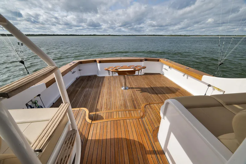 Slide: The Image of Spacious deck of 2002 Paul Mann 60 Custom Carolina yacht on open water. - 40
