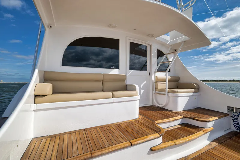 Slide: The Image of Luxurious 2002 Paul Mann 60 Custom Carolina yacht with elegant seating and wooden deck. - 41