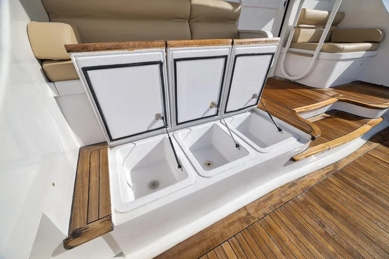 Slide: The Image of Luxury seating and storage on 2002 Paul Mann 60 Custom Carolina yacht. - 45