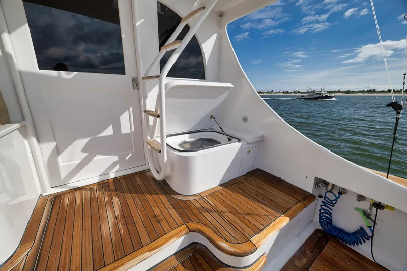 Slide: The Image of 2002 Paul Mann 60 Custom Carolina yacht deck with wooden flooring and ocean view. - 50