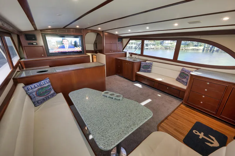 Slide: The Image of Luxurious interior of 2002 Paul Mann 60 Custom Carolina yacht with elegant seating and large windows. - 6