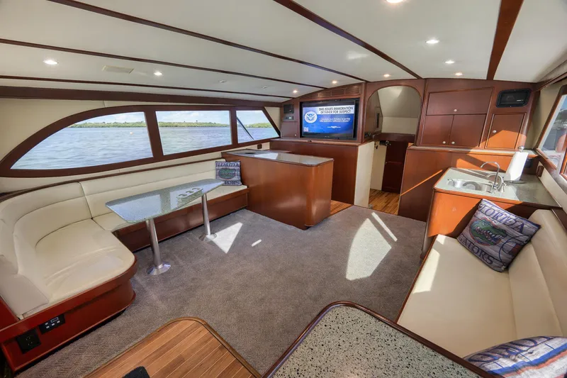 Slide: The Image of Luxurious interior of 2002 Paul Mann 60 Custom Carolina yacht with elegant seating and modern amenities. - 9