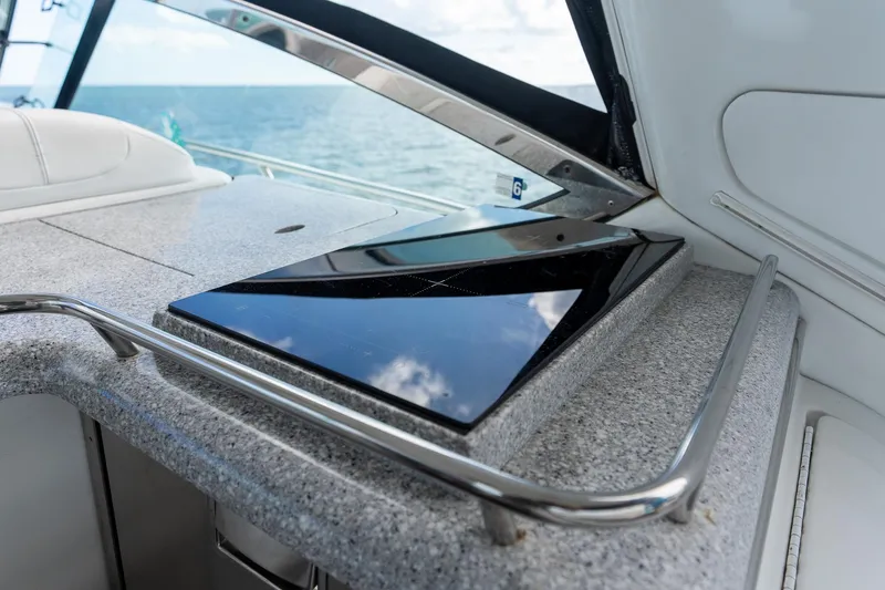 Slide: The Image of 2005 Formula 48 Yacht interior with sleek countertop and ocean view. - 20