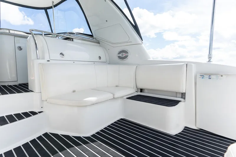 Slide: The Image of 2005 Formula 48 Yacht interior with white seating and striped flooring. - 32