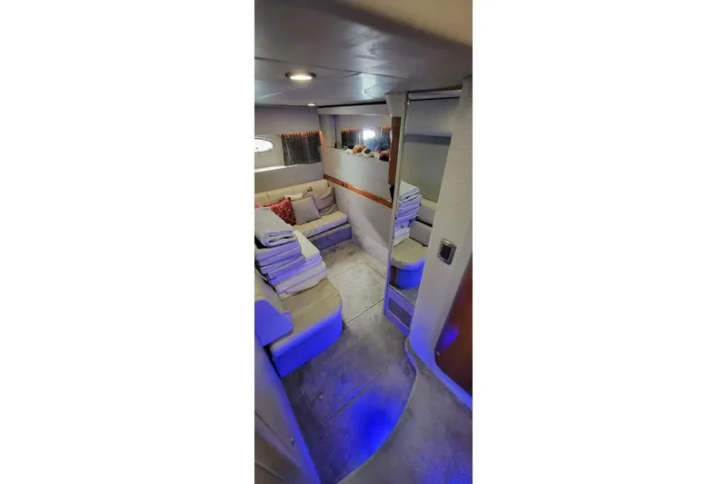 Slide: The Image of Luxurious interior of 2005 Formula 48 Yacht with cozy seating and ambient lighting. - 41