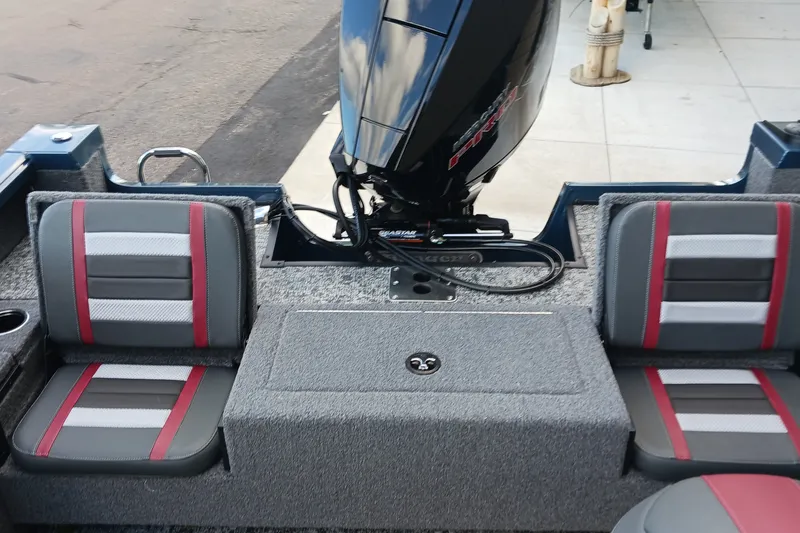 Slide: The Image of 2026 Ranger VS1882SC Reata boat interior with dual seats and motor. - 10