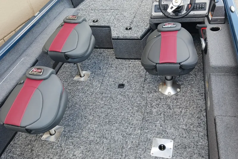 Slide: The Image of 2026 Ranger VS1882SC Reata boat interior with gray and red seating. - 12