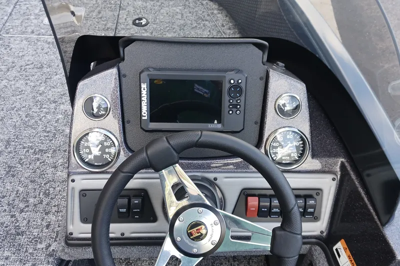 Slide: The Image of 2026 Ranger VS1882SC Reata boat dashboard with steering wheel and Lowrance display. - 5