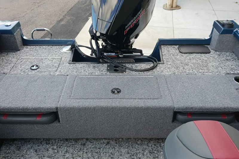 Slide: The Image of 2026 Ranger VS1882SC Reata boat interior with motor and seating. - 9
