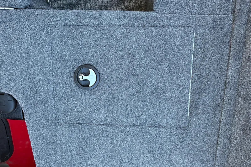 Slide: The Image of Carpeted storage compartment on 2026 Tracker Pro Guide V-16 WT boat. - 39