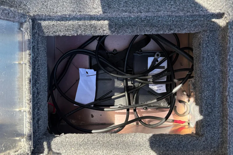 Slide: The Image of Interior wiring of 2026 Tracker Pro Guide V-16 WT boat, showing cables and components. - 24