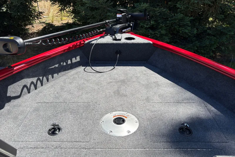 Slide: The Image of 2026 Tracker Pro Guide V-16 WT boat deck with Minn Kota trolling motor. - 30